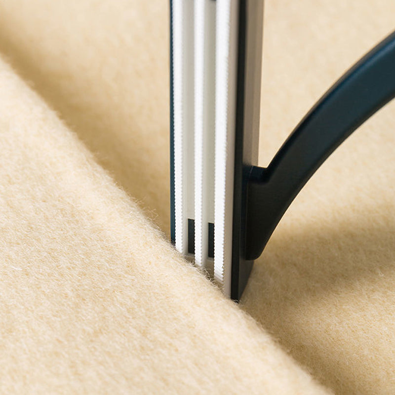 Kaksipuolinen manuaalinen karvanpoistaja