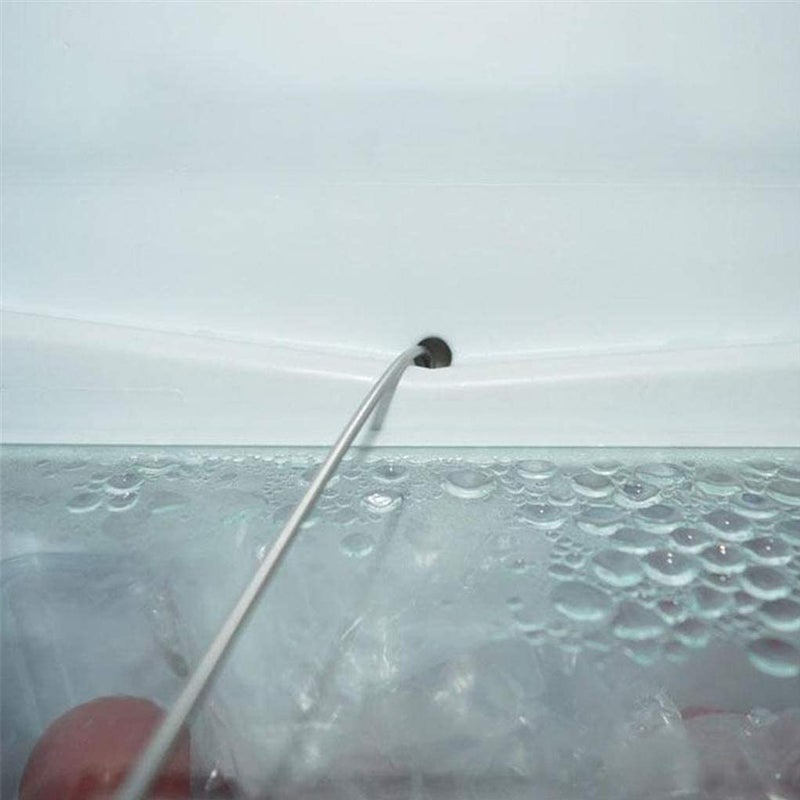 Jääkaapin kondenssivesiaukon puhdistaja