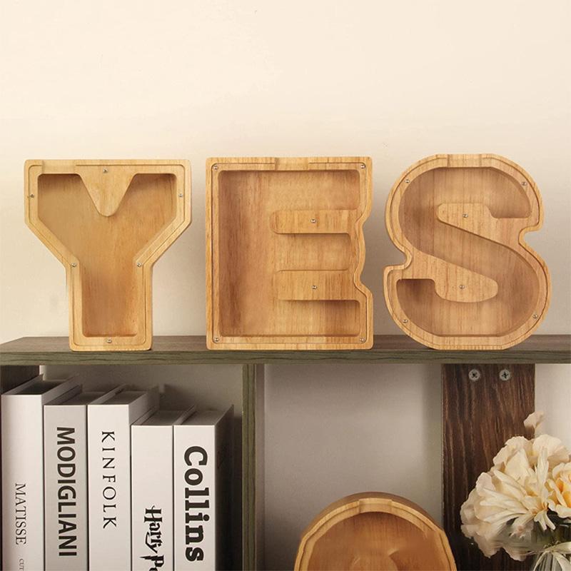 Kirjaimen muotoinen säästölipas