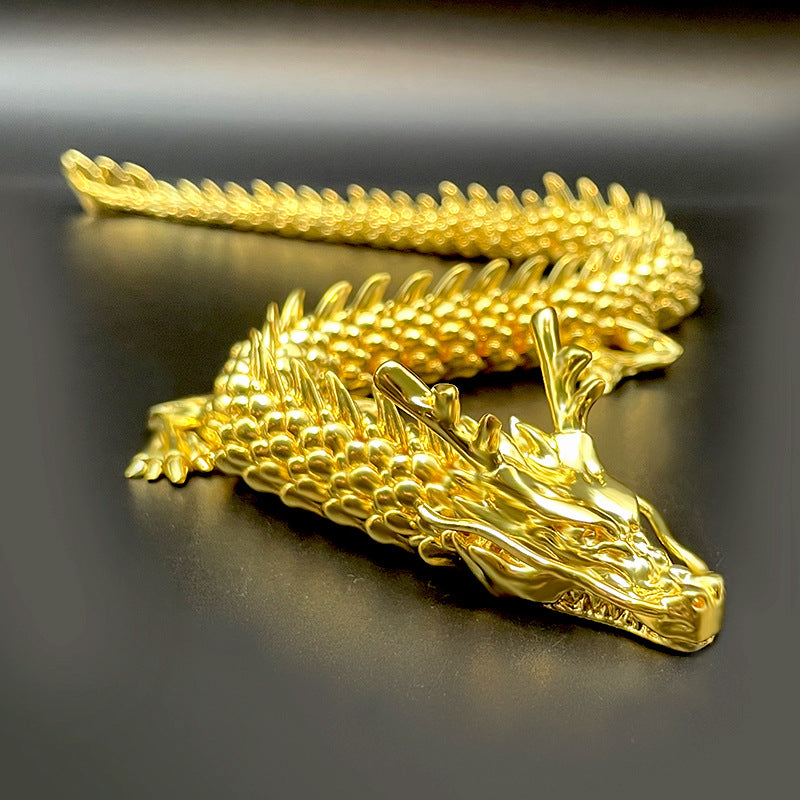 Kultainen lohikäärme, jossa on liikkuvat nivelet