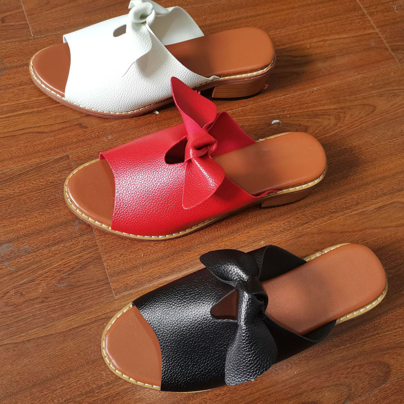 Naisten matalakorkoiset rusetti sandaalit