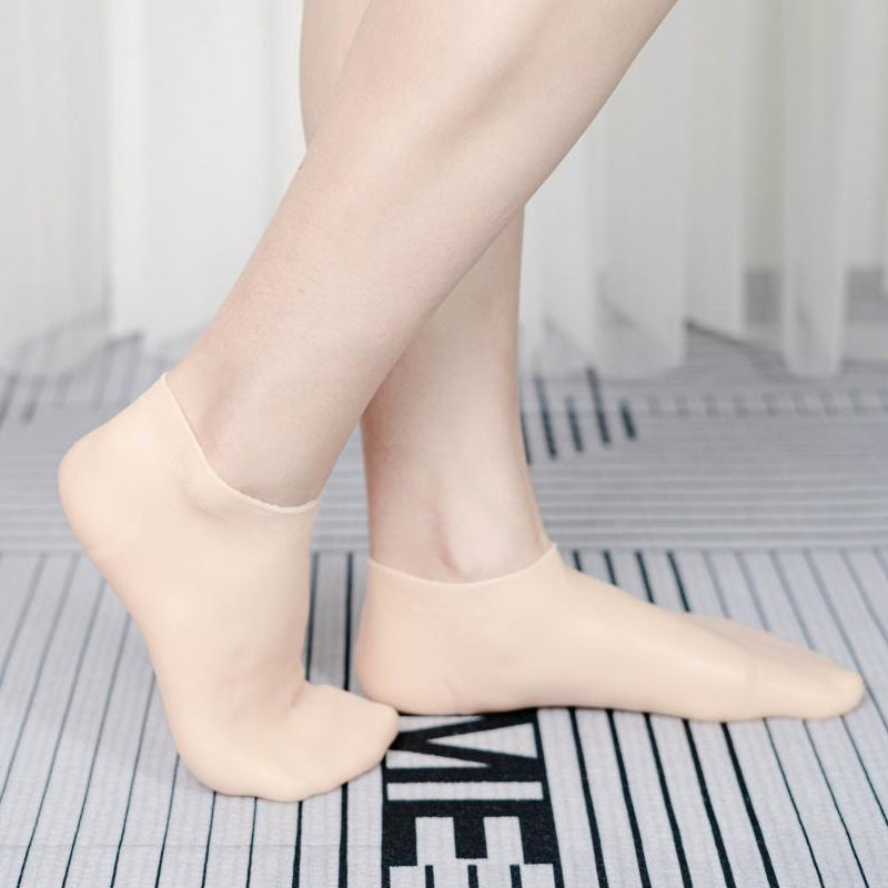 Naisten jalkojen kylpyläpedikyyrisilikonisukkia