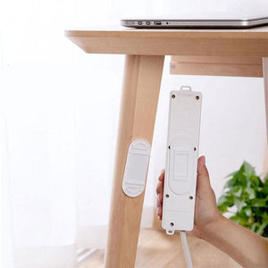 Seinälle ripustettava liitäntäpaneelin pidike