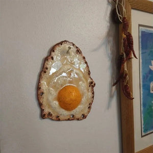 Kananmuna seinällä -koriste