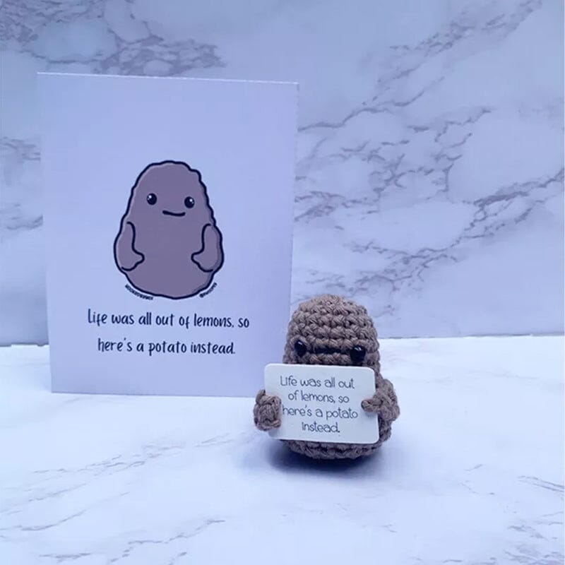 Hauska neulottu perunanukke